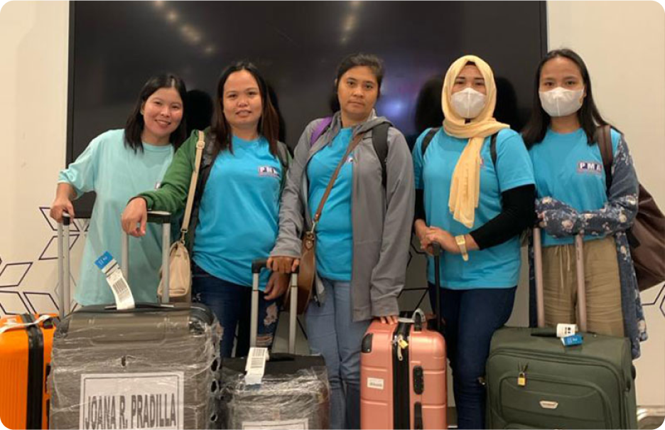 Indonesian domestic helpers arriving at the airport, ready for placement with Malaysian families