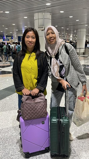 A PMA employer welcoming their new domestic helper at the airport